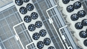 Cooling And Ventilation System Of Data Storage Center Warehouse Building. aerial topdown rotating shot - Powered by Shutterstock - Get 15% off with code: PIKWIZARD15