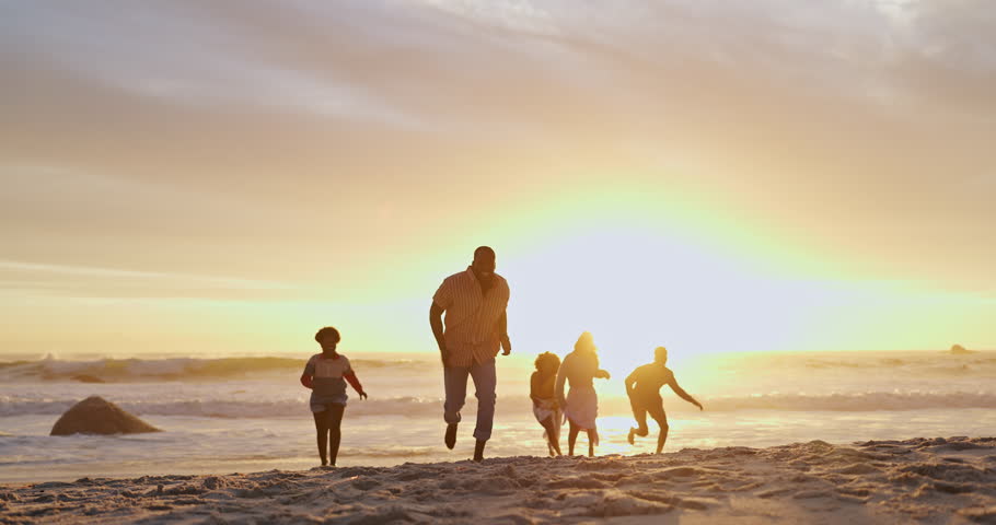 Beach, sunset and group of friends running with waves, fun and summer holiday on tropical island. Men, women and excited people on ocean vacation together with sunshine, sand and energy on adventure Royalty-Free Stock Footage #3475548499