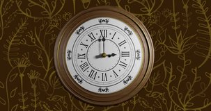 Animation of retro clock ticking showing midnight with gold patter on brown background. New year's eve, new year, festivity, celebration and tradition concept digitally generated video.