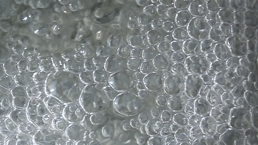Close-up bubbles in a water slow motion 