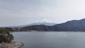 The natural view of Mount Fuji from Lake Kawaguchi is the most popular photo spot for tourists