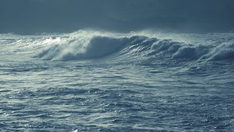 slow motion beautiful waves during a storm, water splashing in slow motion. sardinian sea