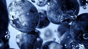 Super Slow Motion Shot of Fresh Blueberries Falling into Water and Creating Bubbles at 1000fps. - Powered by Shutterstock - Get 15% off with code: PIKWIZARD15