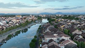 Drone footage of Hoi An ancient town with Thu Bon river, Quang Nam, Vietnam