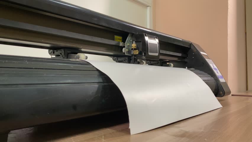 paper plotter. flatbed plotter for cutting. close-up of the device. slow-motion video. High-quality shooting in 4K format. Royalty-Free Stock Footage #3475765301