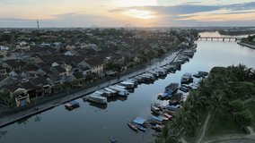 Drone footage of Hoi An ancient town with Thu Bon river, Quang Nam, Vietnam