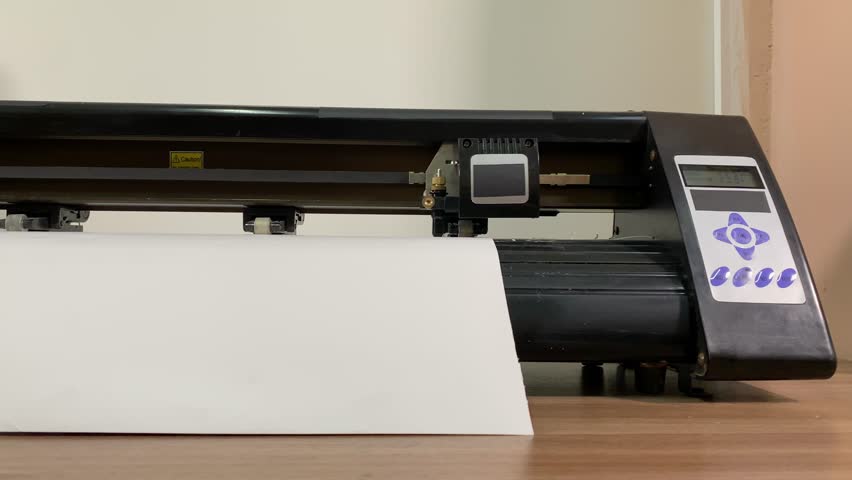 paper plotter. flatbed plotter. making stickers. slow motion video. High-quality shooting in 4K format. Royalty-Free Stock Footage #3475766691