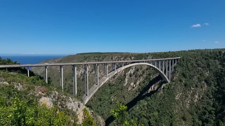 South Africa - Cars drive over the Bloukrans Bridge on a sunny day