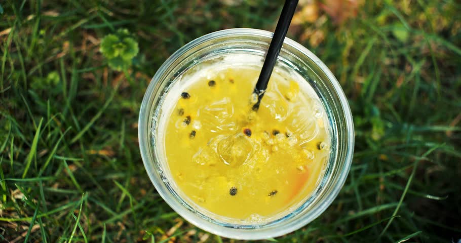 Healthy summer spring lemonade on the grass . Tropical lemonade. Fresh drinks in the park