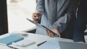 Business Collaboration, Analyzing Financial Data for Strategy Planning Engage in a collaborative session where business teams analyze financial data and marketing reports to brainstorm and strategy - Powered by Shutterstock - Get 15% off with code: PIKWIZARD15