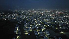 An aerial view of Dehradun, a smart Indian city. The top-angle views of the city's residential houses, a beautiful Indian city at night.