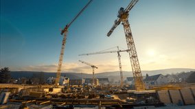 Time-lapse footage of a large construction site with several busy cranes in nice morning light, with emerging and dissolving clouds
 - Powered by Shutterstock - Get 15% off with code: PIKWIZARD15