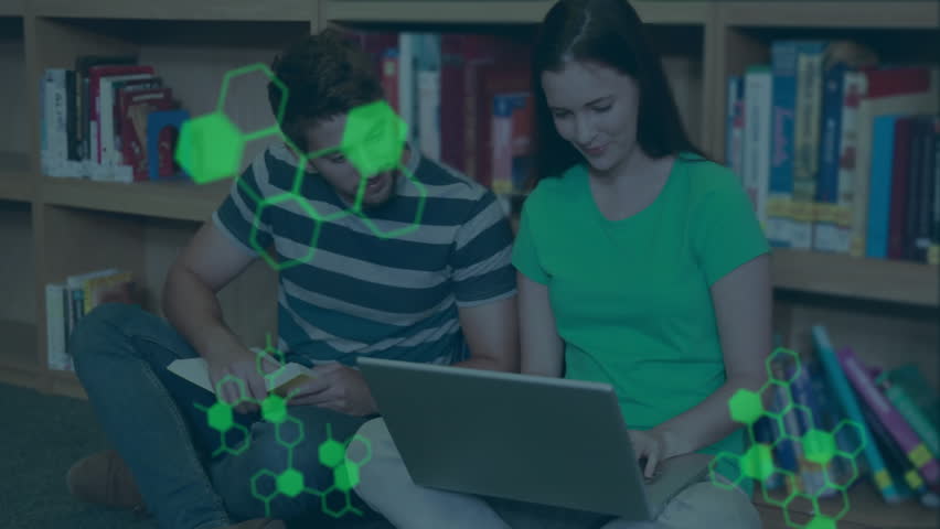 Animation of chemical formula and data processing over diverse students using laptop. Global education, science, computing and digital interface concept digitally generated video. - Powered by Shutterstock - Get 15% off with code: PIKWIZARD15