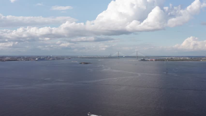 Super wide aerial dolly shot of Charleston Harbor with Patriot