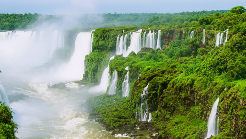 Timelapse of Waterfalls of Iguazu around a big green area and a river, in a sunny day, Foz do Iguacu, Parana, Brazil Royalty-Free Stock Footage #3476670837