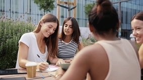 Happy female college university students team learning and working together - Powered by Shutterstock - Get 15% off with code: PIKWIZARD15
