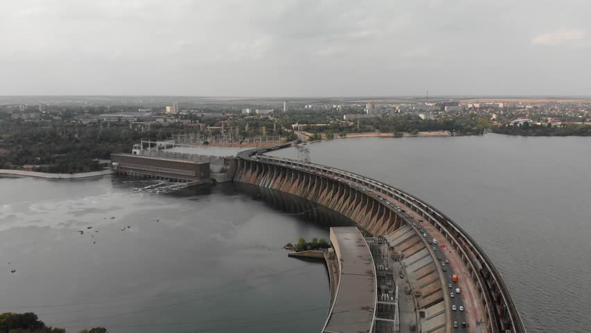 A beautiful view from above of the largest hydroelectric power plant in Ukraine - the Dnieper Hydroelectric Power Station. Dneproges before the shelling of Russian troops. Top view city of Zaporozhye.