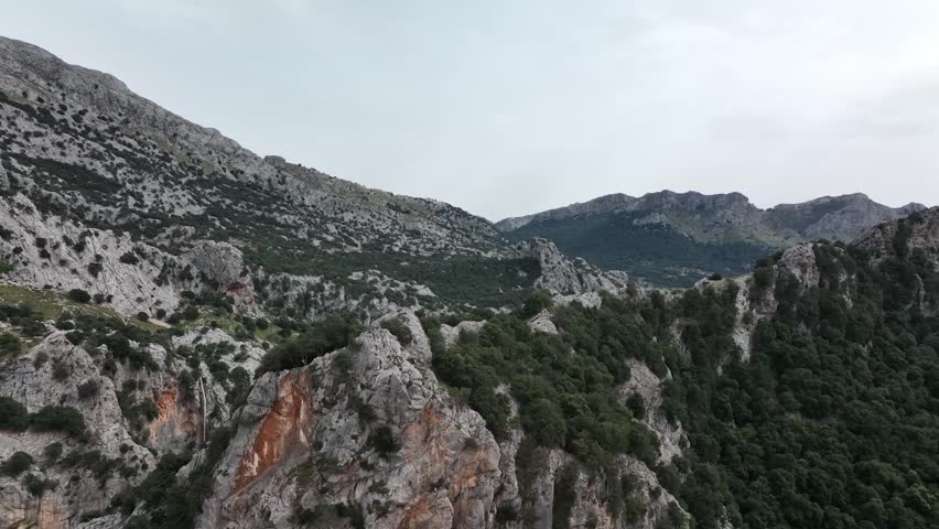 Sa calobra Mallorca Spain has one of the most beautiful landscapes, with rocks all over the lake, beautiful mountains, and all the nature in one same place Royalty-Free Stock Footage #3476866445