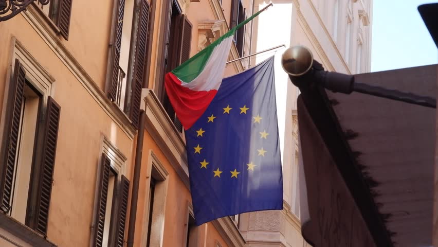 big italian flag waving in the wind on sunny day Royalty-Free Stock Footage #3476873699