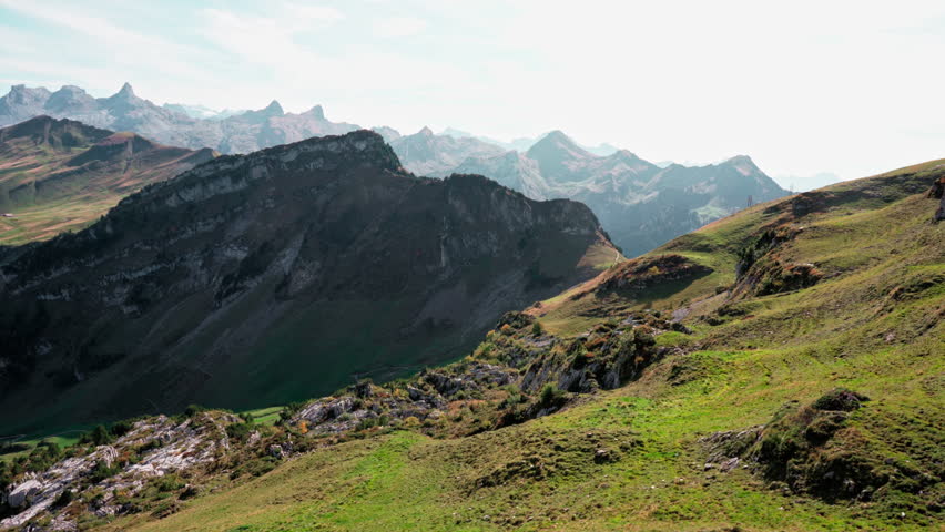 Wide view of Swiss Alps in autumn or fall. Mountains of Switzerland
