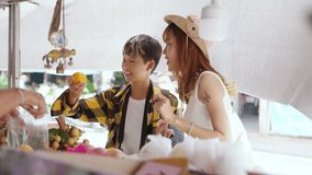 Asian woman friends buying and eating street food fresh fruit at railway station with using mobile app on smartphone scan QR code making online payment during travel local town on summer vacation. - Powered by Shutterstock - Get 15% off with code: PIKWIZARD15