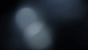 White lens flares Light Leak overlay on black background. Spherical Optical Light abstract background. High quality 4k footage - Powered by Shutterstock - Get 15% off with code: PIKWIZARD15