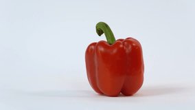 Red sweet pepper on white background. Bell peppers, paprika, rotation on white. Free space for text. Copy space. red bell pepper, perfectly ripe and glossy, isolated on a white background.  - Powered by Shutterstock - Get 15% off with code: PIKWIZARD15