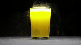 Glass Of Effervescent Fizzy Orange Flavor Drink With Vitamin Tablet Floating and Black Background  - Powered by Shutterstock - Get 15% off with code: PIKWIZARD15