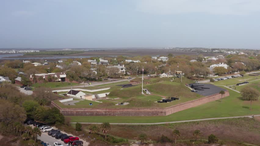 Wide reverse pullback shot of historic Fort Moultrie on Sullivan