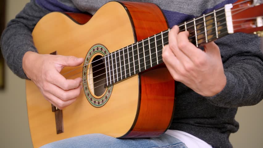 Close-up shot of a man playing the bossa nova rhythm Royalty-Free Stock Footage #3477374425