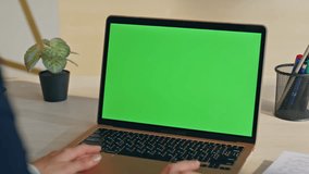 Businesswoman greeting mockup laptop having video conference sitting office closeup. Unrecognizable woman manager talking on webcam green screen computer. Lady working with chromakey display alone  - Powered by Shutterstock - Get 15% off with code: PIKWIZARD15
