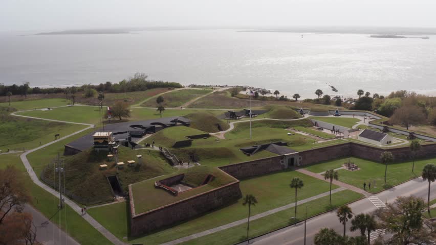 Panning close-up aerial shot of historic Fort Moultrie protecting Charleston Harbor on Sullivan