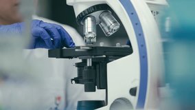 Scientists using microscope in Bio lab and experiment, Concept science and technology - Powered by Shutterstock - Get 15% off with code: PIKWIZARD15