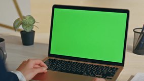 Formal lady having videocall green screen laptop gesturing hands at home closeup. Unrecognizable director talking online at mockup computer. Boss looking chroma key making virtual conference indoors