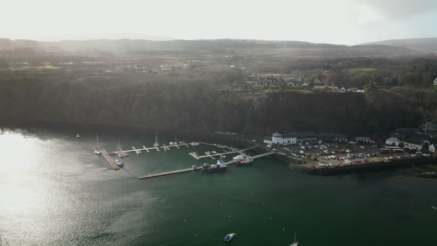 Circular Aerial Reveal of Harbor of Tobermory With Boats in Water Royalty-Free Stock Footage #3477556727