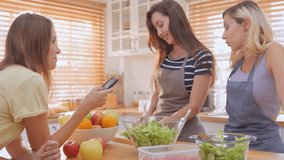 Caucasian young women friend spending time together in kitchen at home. Attractive romantic girl feeling happy and relax, enjoy cooking foods for breakfast with happiness. Homosexual-LGBTQ concept. - Powered by Shutterstock - Get 15% off with code: PIKWIZARD15