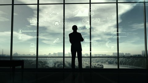Silhouette of man and corporate infographics