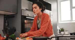 Woman, cooking and talking with video recording as vlogger for social media with vegetable, live streaming or online. Food influencer, camera and teaching in home kitchen, subscription or tutorial
