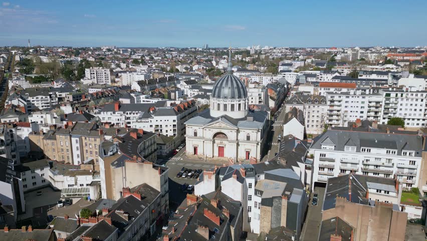 Birdseye view of Notre Dame de Bon Port church, Nantes City in France. Aerial forward