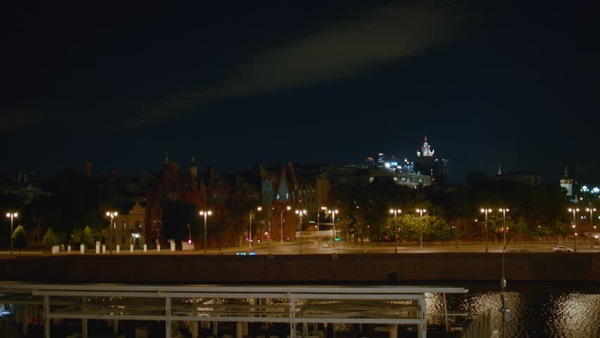 View of the Cathedral of Christ the Savior from the Moscow River, at night in Moscow, Russia. High quality 4k footage