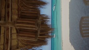 Tropical destination lounge on Bahia de las aguilas beach with view on yachts