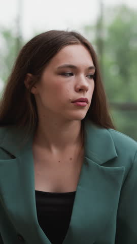 Woman in formal suit unwinds on swings. Businesswoman seeks relief from toll of relentless decision-making at work. Stress of intricate financial negotiations