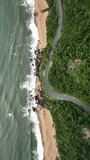 Balneario Camboriu in Santa Catarina. Taquaras Beach and Laranjeiras Beach. Aerial view in landscape. Brazil. Vertical video