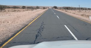 Video on a highway in Namibia taken from a car while driving during the day
