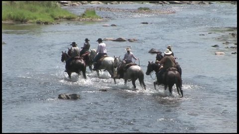 COWBOYS CROSS COLORADO RIVER