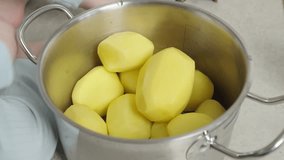 The video shows a child playing with potatoes in a pot, developing motor skills and imagination. Suitable for children's educational videos and toy commercials.