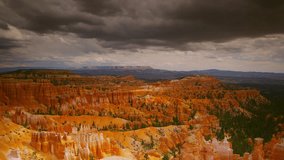 Bryce Canyon with afternoon monsoon storms roiling above the canyons famous hoodoos and sandstone spires. - Powered by Shutterstock - Get 15% off with code: PIKWIZARD15
