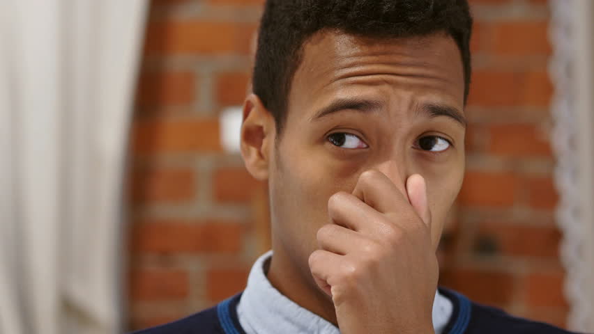 Black Man Sniffing Pizza