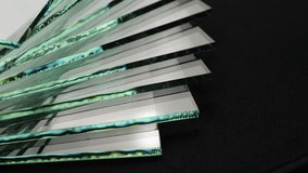 Sheets of Factory manufacturing tempered clear float glass panels cut to size. - Powered by Shutterstock - Get 15% off with code: PIKWIZARD15