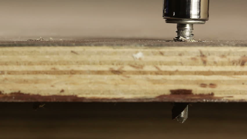 Screwing bolt into lumber